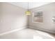 Well-lit bedroom with tile floors and bright window at 2125 Shackley Pl, Apopka, FL 32703