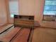 Bedroom featuring a headboard and two windows, offering a functional space at 2320 Pebble Brook Rd, Kissimmee, FL 34741
