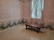 Bedroom with a window and hardwood floors at 2320 Pebble Brook Rd, Kissimmee, FL 34741
