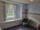 Bedroom with a bay window and built-in shelving at 2320 Pebble Brook Rd, Kissimmee, FL 34741