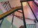 Looking up from the bottom of a stairwell with metal railing at 2320 Pebble Brook Rd, Kissimmee, FL 34741