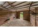 Open barn with wooded walls and doorway view to outside at 2326 Florida Ave, Oviedo, FL 32765