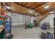 Large garage with white door and staircase for additional space at 2326 Florida Ave, Oviedo, FL 32765