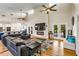 Spacious living room with high ceilings, hardwood floors, fireplace, and open floor plan at 2326 Florida Ave, Oviedo, FL 32765