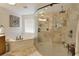 Luxurious bathroom features a soaking tub and separate glass-enclosed shower with stone tile at 2349 Plantation Oak Dr, Orlando, FL 32824