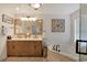 Stylish bathroom features a double sink vanity and a separate soaking tub at 2349 Plantation Oak Dr, Orlando, FL 32824