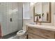 Updated bathroom with glass enclosed shower and modern vanity at 2349 Plantation Oak Dr, Orlando, FL 32824