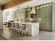 Spacious kitchen with a white island, custom cabinets, and ample counter space at 2349 Plantation Oak Dr, Orlando, FL 32824
