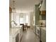 Spacious kitchen with a white island, stainless steel appliances, and ample counter space at 2349 Plantation Oak Dr, Orlando, FL 32824