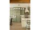 Modern kitchen features a large island, stylish tile backsplash, and stainless steel appliances at 2349 Plantation Oak Dr, Orlando, FL 32824