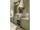 Modern kitchen features stainless steel appliances and stylish countertops at 2349 Plantation Oak Dr, Orlando, FL 32824