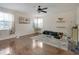 Large living room featuring hard wood floors and multiple windows at 2349 Plantation Oak Dr, Orlando, FL 32824