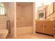 Standard bathroom featuring a shower/tub combination with vintage style sink and cabinetry at 2361 Kimberly Dr, Deltona, FL 32738