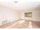 Bright living room with neutral carpet and window providing natural light at 2361 Kimberly Dr, Deltona, FL 32738
