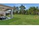 Spacious backyard with well-maintained lawn, great for entertainment and leisure at 2449 Southlawn Ln, Clermont, FL 34714
