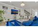 Well-decorated living area with modern furnishings, decor and a staircase at 2449 Southlawn Ln, Clermont, FL 34714