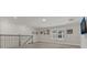 Spacious loft area with neutral carpeting and natural light at 2449 Southlawn Ln, Clermont, FL 34714