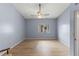 Spacious bedroom with wood floors, a ceiling fan, and a window at 2486 Citrus Club Ln # 408, Orlando, FL 32839