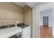 Laundry room with white washer and dryer at 2486 Citrus Club Ln # 408, Orlando, FL 32839