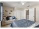 Cozy bedroom featuring a comfortable sofa, ceiling fan, and a serene ambiance at 281 Primrose Dr, Davenport, FL 33837