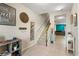 Welcoming foyer with tile flooring, staircase, and decorative accents at 281 Primrose Dr, Davenport, FL 33837