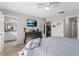 Spacious bedroom with a gray dresser, walk-in closet, and en-suite bathroom at 281 Primrose Dr, Davenport, FL 33837