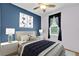 Cozy bedroom with stylish decor, ambient lighting, and a relaxing atmosphere, ready for rest at 3677 Serena Ln, Clermont, FL 34711