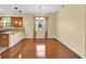 Stylish kitchen features stainless steel appliances, granite countertops, and ample cabinet space at 3677 Serena Ln, Clermont, FL 34711