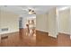 Spacious living room with hardwood floors and neutral walls is perfect for entertaining and everyday living at 3677 Serena Ln, Clermont, FL 34711