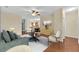 Open concept living area showcasing seamless flow into the kitchen, perfect for modern living at 3677 Serena Ln, Clermont, FL 34711