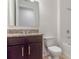 Bathroom featuring granite countertops, modern vanity and fixtures, and tiled shower and flooring at 3975 Kennebunk Loop, Mount Dora, FL 32757