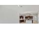 Open concept living area with kitchen, dining area and front entrance with lots of light at 3975 Kennebunk Loop, Mount Dora, FL 32757
