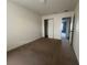 Bedroom featuring neutral carpet and a closet for storage at 4650 Staghorn Dr # 500, Orlando, FL 32808