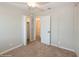 The bedroom features a ceiling fan, window, closet, and standard door, providing a functional and inviting space at 4816 Crow St, Orlando, FL 32819