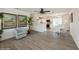 Open-concept dining area flows into a modern kitchen with stainless appliances at 4816 Crow St, Orlando, FL 32819