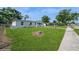 Well-maintained home with a large yard and mature trees at 4816 Crow St, Orlando, FL 32819