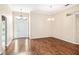Bright entryway with hardwood floors and transom windows above the front door at 487 Foxhill Dr, Debary, FL 32713