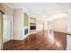 Living room features a fireplace, built-in shelves, and an open floor plan at 487 Foxhill Dr, Debary, FL 32713