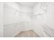 Walk-in closet with carpet and wire shelving at 487 Foxhill Dr, Debary, FL 32713