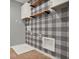 Laundry Room features cabinets and shelving at 5967 Churchill Square Way, Groveland, FL 34736