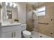 Modern bathroom with a glass-enclosed shower, and updated fixtures at 614 Plum Ln, Altamonte Springs, FL 32701