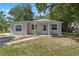 Charming single-story home featuring a well-maintained yard and neutral exterior paint at 614 Plum Ln, Altamonte Springs, FL 32701