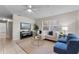 Bright living room with stylish furniture, decorative accents, and tile flooring at 614 Plum Ln, Altamonte Springs, FL 32701