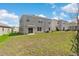 Expansive backyard with lush green grass, perfect for outdoor activities and entertaining at 616 Griffon Ave, Lake Alfred, FL 33850