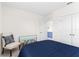 Comfortable bedroom with a full-sized bed and plush carpeting at 616 Griffon Ave, Lake Alfred, FL 33850