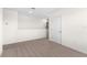 Bonus room/loft area with plush carpeting at 616 Griffon Ave, Lake Alfred, FL 33850