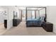 Serene main bedroom with a canopy bed, neutral colors, and an en-suite bathroom at 616 Griffon Ave, Lake Alfred, FL 33850