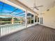 View of the screened-in lanai overlooking the pool and gazebo, perfect for outdoor relaxation and entertaining at 6161 Blakeford Dr, Windermere, FL 34786