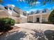 Inviting two-story home featuring a spacious driveway and traditional architectural details at 6161 Blakeford Dr, Windermere, FL 34786