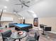 Fun game room with pool table, arcade games, and ample seating, ideal for entertaining guests at 6161 Blakeford Dr, Windermere, FL 34786